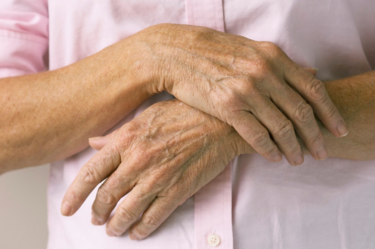 Senior woman's hands --- Image by © Darren Kemper/Corbis