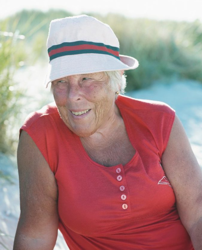 20 Jul 2013 --- Portrait of smiling senior woman, Skine, Sweden --- Image by © Fredrik Nyman/Johnér Images/Corbis