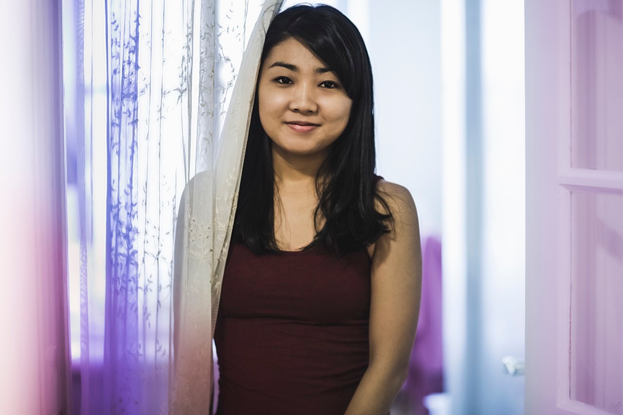 09 Oct 2014 --- Portrait of young Asian woman --- Image by © Chad Springer/Corbis