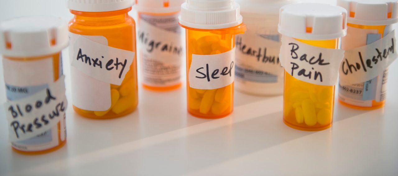 14 Mar 2014 --- Studio shot of pill bottles --- Image by © Jamie Grill/Tetra Images/Corbis