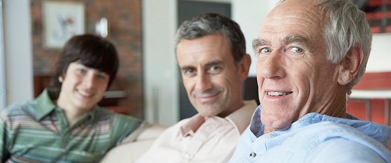 Grandfather sitting with son and grandson --- Image by Â© Tomas Rodriguez/Corbis
