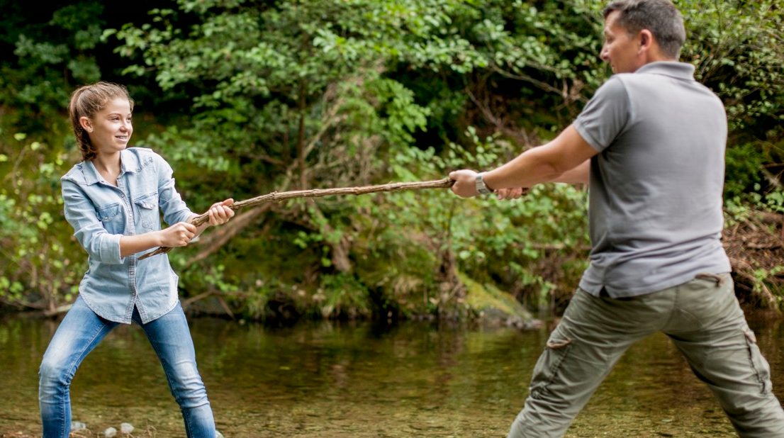 26 Oct 2013 --- Father and daughter playing in a park --- Image by © Letizia Le Fur/Onoky/Corbis
