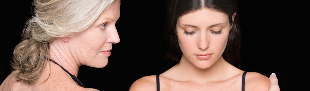 Mother comforting daughter --- Image by © Joerg Steffens/Corbis