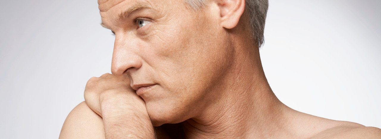 Man with pensive expression --- Image by © Mario Castello/Corbis