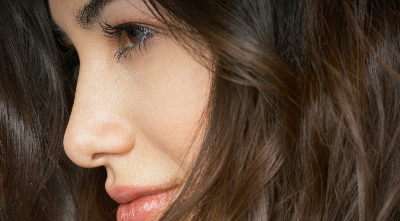 Woman with long brown hair --- Image by © Beau Lark/Corbis