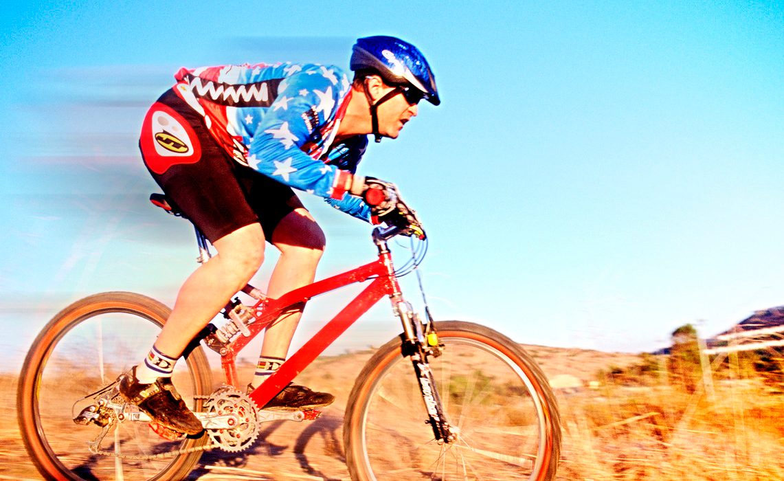 Mountain Biker in the Wilderness --- Image by © Corbis