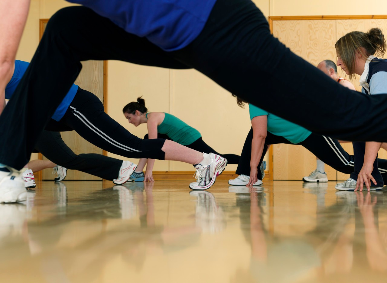 Aerobic exercise at gym --- Image by © Colin Hawkins/cultura/Corbis